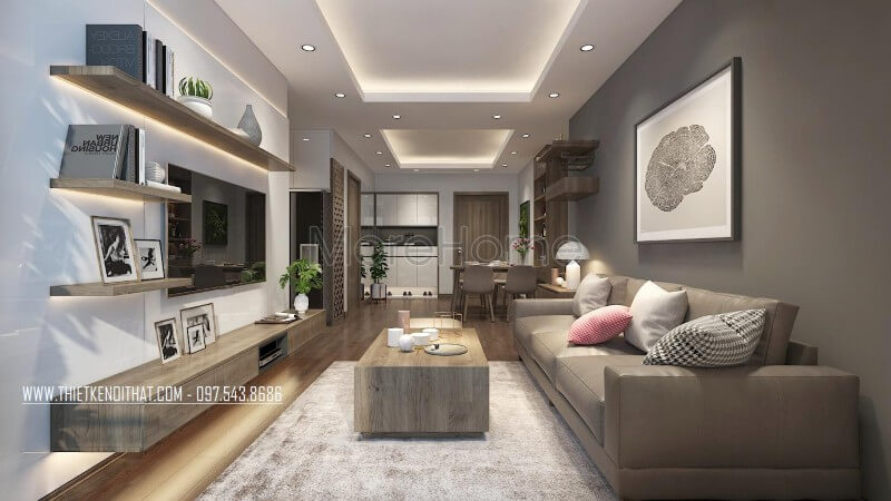 Phòng khách nhỏ được thiết kế tối giản nhưng tiện nghi và sang trọng, gam màu xám làm chủ đạo hài hòa. Thiết kế chung cư
