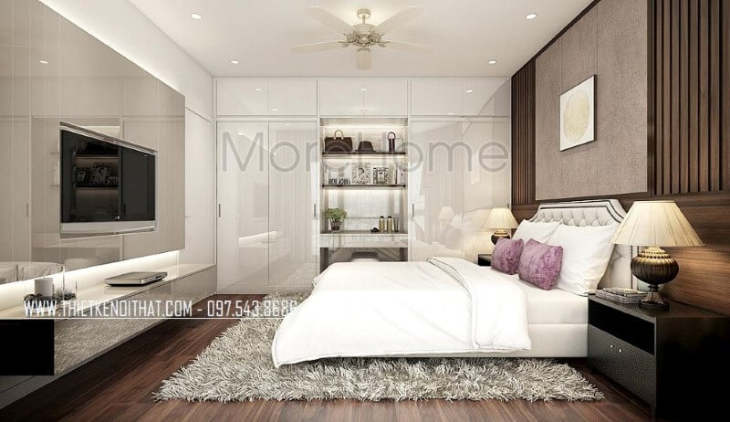 Tủ quần áo hiện đại vừa làm bàn trang điểm vừa để đồ trang trí vừa tận dụng không gian để quần áo với cửa 4 cánh cùng hệ tủ để đồ trên khá ngăn nắp giúp phòng ngủ trở nên gọn gàng, đẹp nhưng vẫn toát lên vẻ sang trọng, độc đáo. Thiết kế chung cư